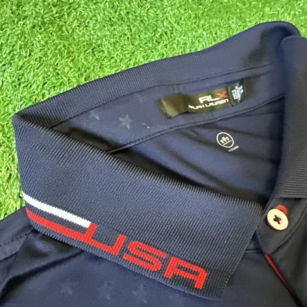 RLX Ralph Lauren Athletic Polo Shirt Mens 2XL Blue USA Open 2018 Patch Flag Logo